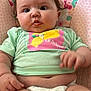Pearl joined the competition — help win amazing prizes! baby, infant, diaper, cute, child, mint_green_shirt, lemon_graphic, floral_pattern, baby_chair, pink_background, stars, chubby_cheeks, curious_expression, pout, hand, legs, indoor, closeup, skin, person