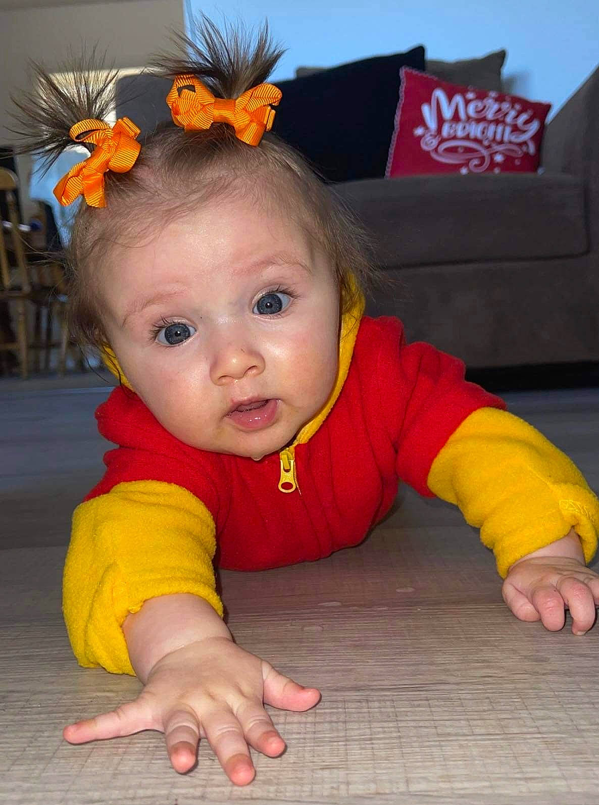 Mallory joined the competition — help win amazing prizes! baby, baby_toddler_clothing, cheek, child, chin, eye, face, flooring, flower, fun, grass, hair, happy, head, human_body, orange, person, plant, skin, surprise