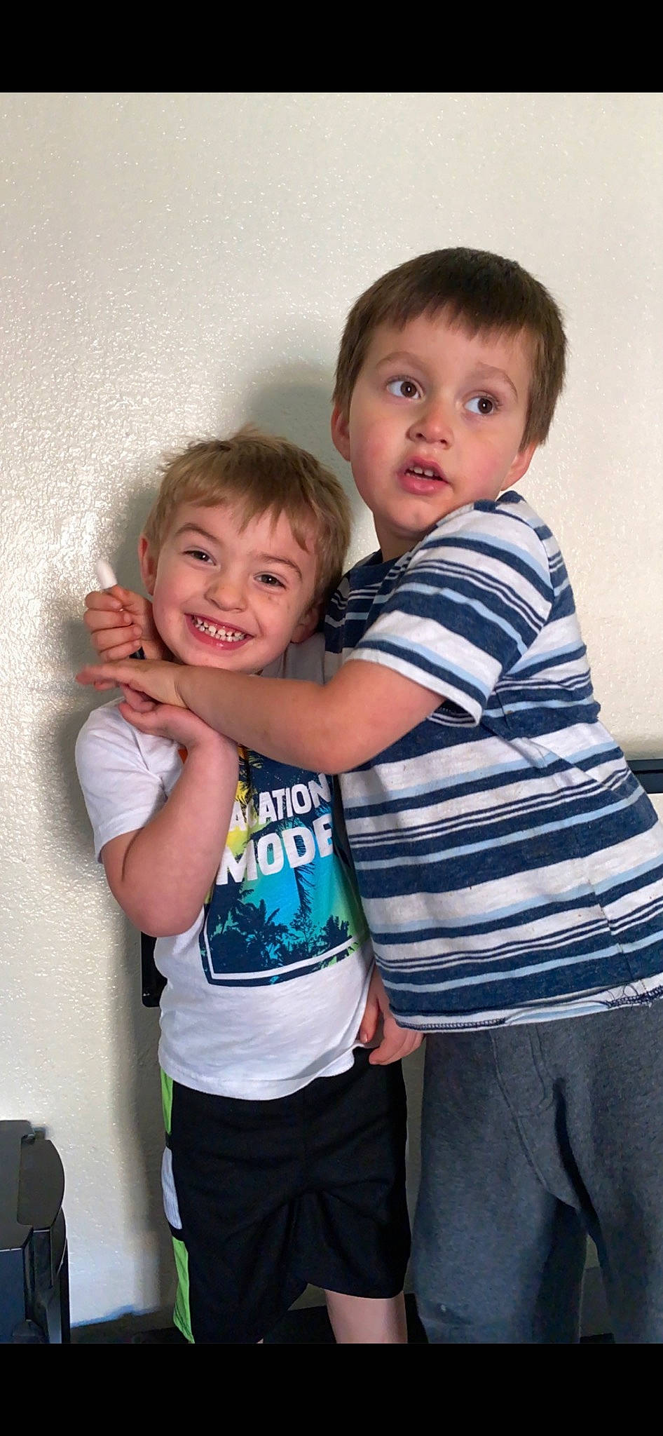 Troy is registered to the contest to win money with this photo: baby_toddler_clothing, cheek, cool, face, facial_expression, gesture, hair, happy, head, human_body, iris, joint, joy, nose, person, shoulder, sleeve, smile, standing, surprise