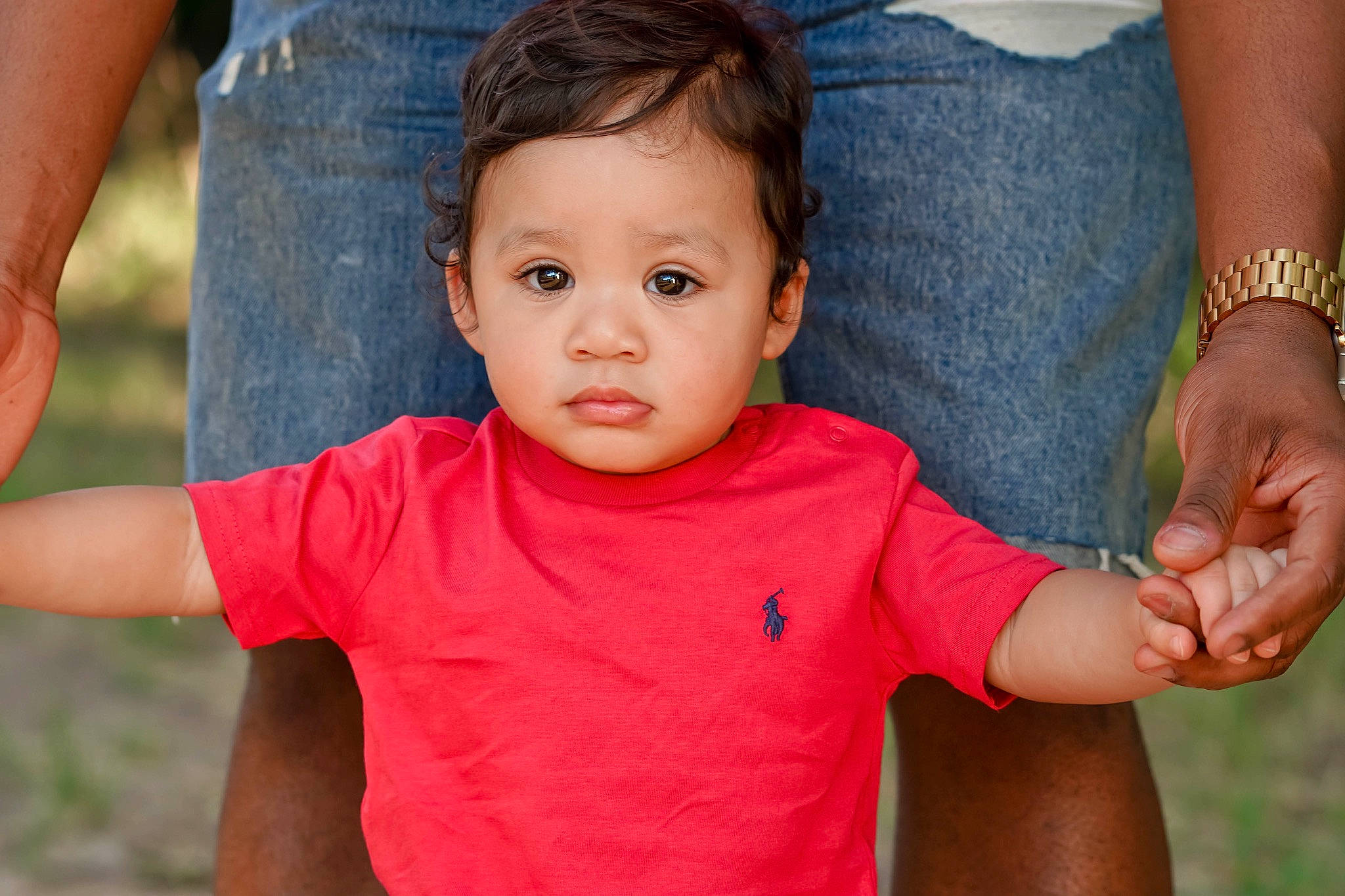 Marquis is registered to the contest to win money with this photo: arm, baby, cheek, child, finger, gesture, hand, person, skin, smile, thumb, toddler