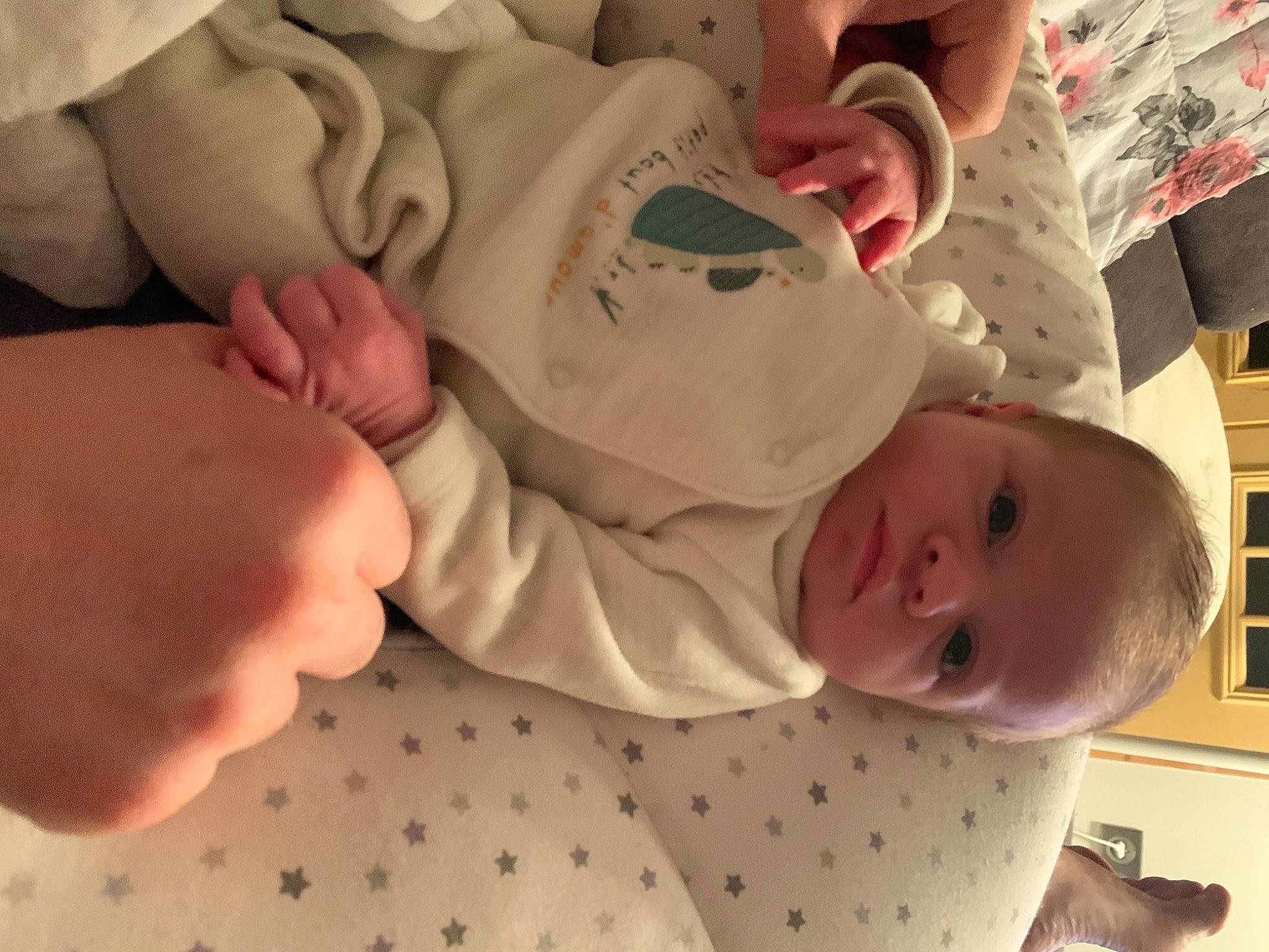 Hannah participe au concours pour gagner de l'argent avec cette photo : baby, baby_toddler_clothing, cheek, child, chin, comfort, eye, finger, gesture, hand, head, human_body, mouth, nose, pattern, person, skin, sleeve, thumb, toddler