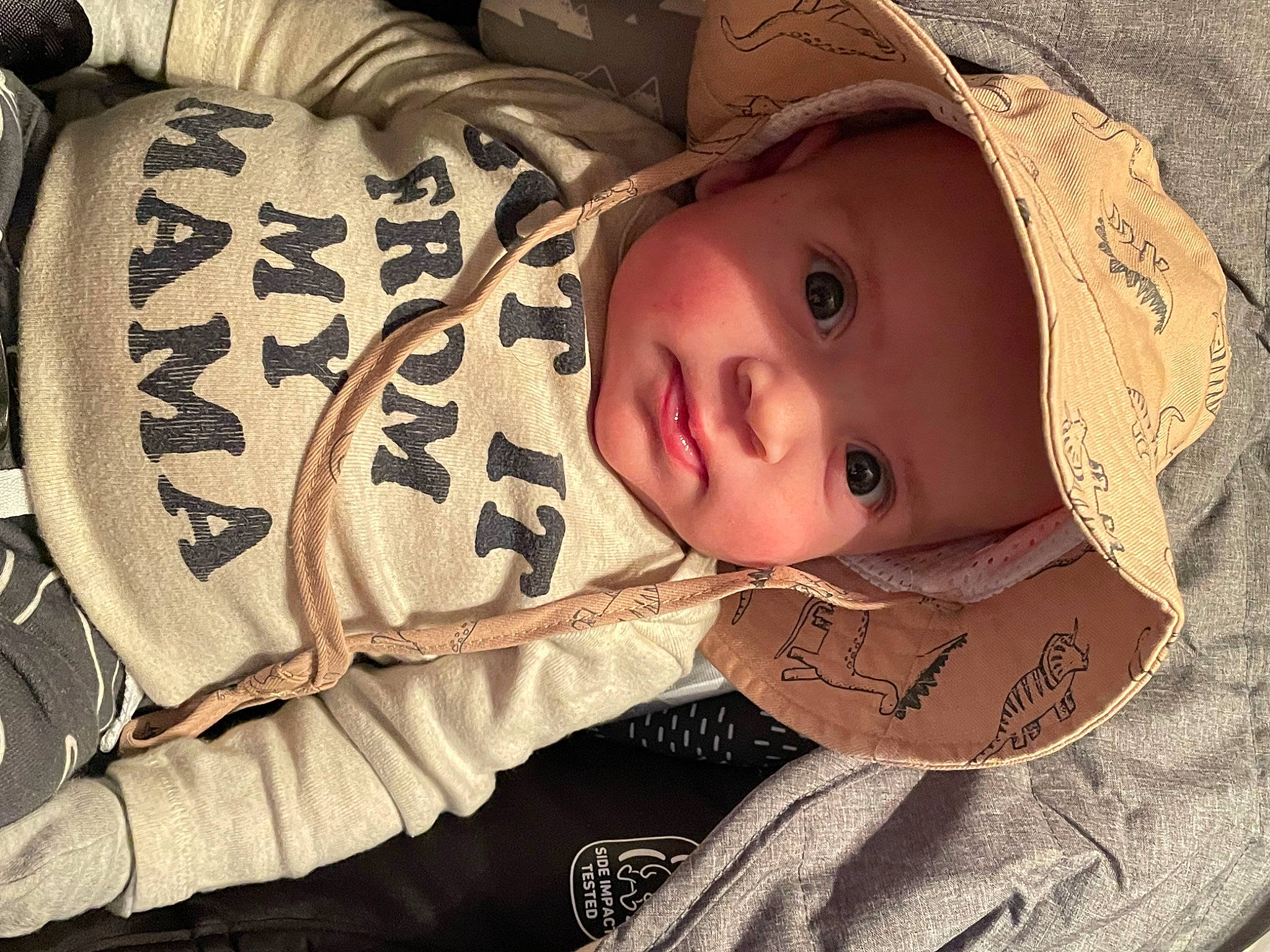Knox joined the competition — help win amazing prizes! baby, baby_products, baby_toddler_clothing, brown, cheek, child, comfort, eyelash, fashion_accessory, happy, hat, headwear, pattern, person, sitting, sleeve, sun_hat, textile, toddler, wood