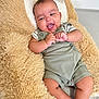 Haroun participe au concours pour gagner de l'argent avec cette photo : baby, child, clothing, comfort, cushion, cute, face, hands, happy, happy_expression, indoor, infant, lying_down, person, plush, romper, skin, smiling, soft, young