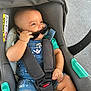 Haroun participe au concours pour gagner de l'argent avec cette photo : accessory, baby, car_seat, casual, child, clothing, cute, denim, face, hand, happy, infant, outdoor, person, playful, safety, seatbelt, smiling, summer, sunglasses