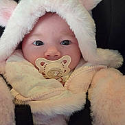 Alexandria is registered to the contest to win money with this photo: baby, infant, pacifier, hood, fur, cute, face, eyes, clothing, soft, cozy, child, portrait, closeup, warm, pink, newborn, cute_outfit, animal_ears, babywear