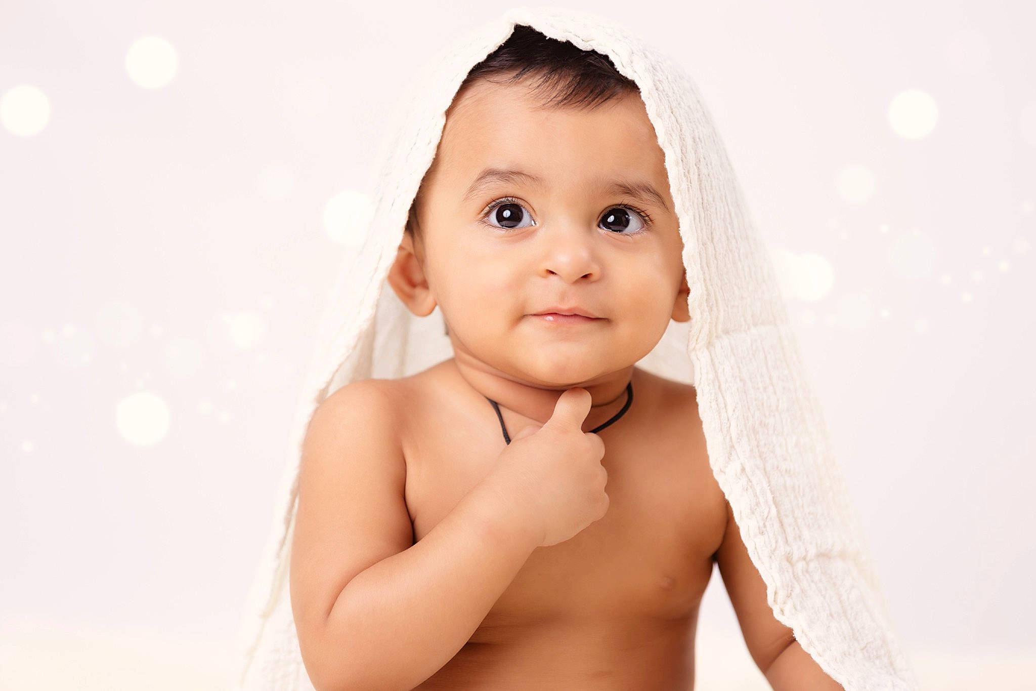 Avyaan is registered to the contest to win money with this photo: arm, baby, cheek, chin, ear, elbow, eyebrow, eyelash, face, flash_photography, gesture, happy, iris, lip, neck, no_expression, nose, person, skin, stomach