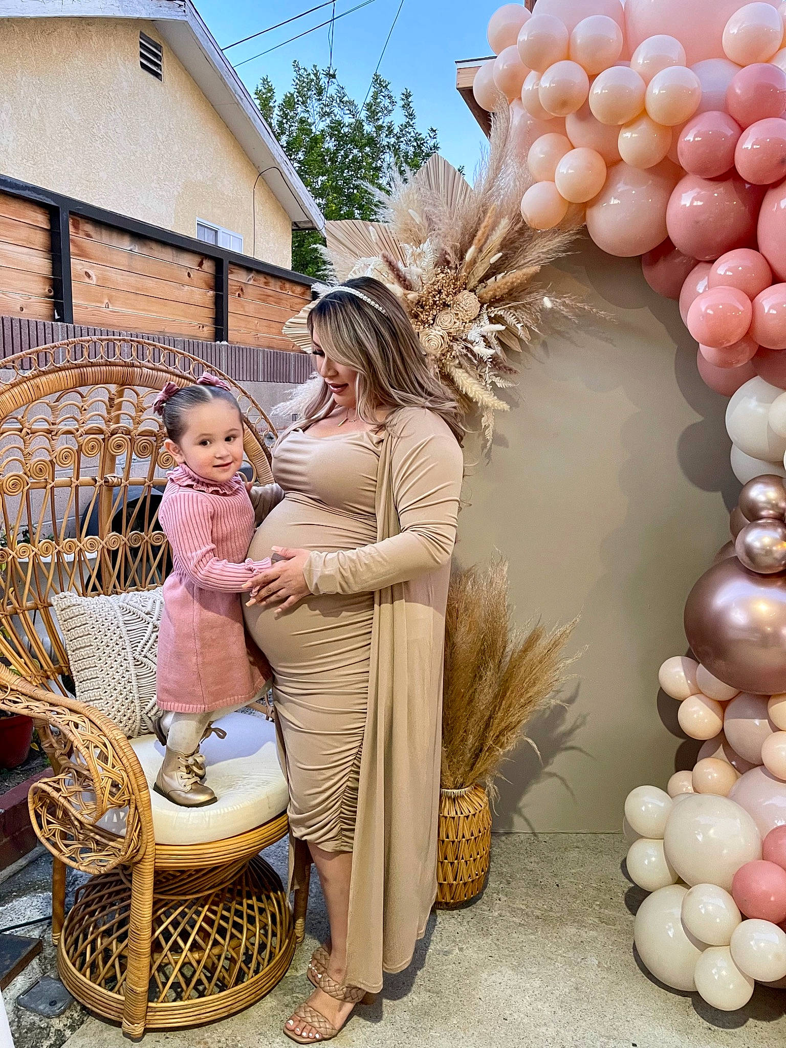Camila is registered to the contest to win money with this photo: baby, balloon, beauty, chair, event, fashion, fashion_accessory, floral_design, formal_wear, grass, happy, joy, party_supply, peach, person, photograph, plant, stock_photography, toddler, toy
