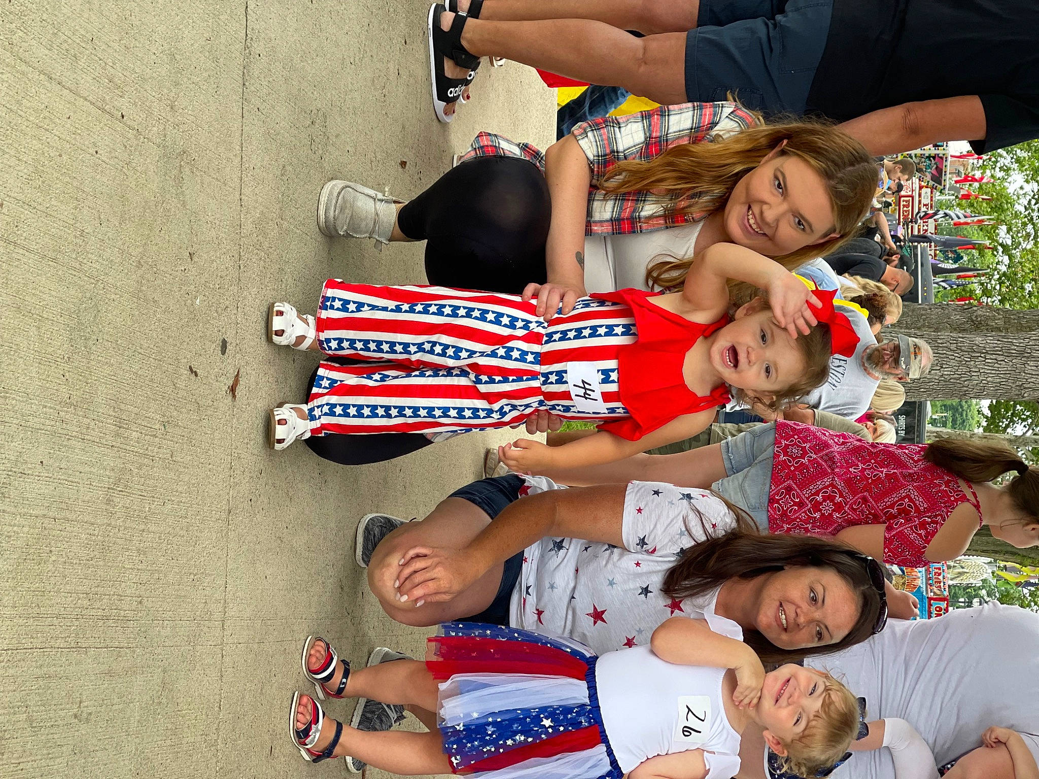 Emberlynn is registered to the contest to win money with this photo: arm, baby_toddler_clothing, child, event, font, fun, hand, happy, headwear, human_leg, joy, leisure, person, recreation, red, sandal, shorts, smile, t_shirt, thigh