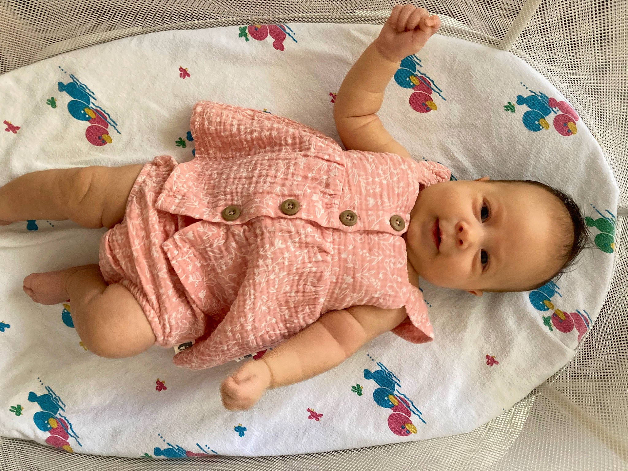 Cooper is registered to the contest to win money with this photo: arm, baby, baby_products, baby_safety, baby_sleeping, baby_toddler_clothing, cheek, child, comfort, face, finger, hand, linens, pattern, person, pink, product, skin, sleeve, textile