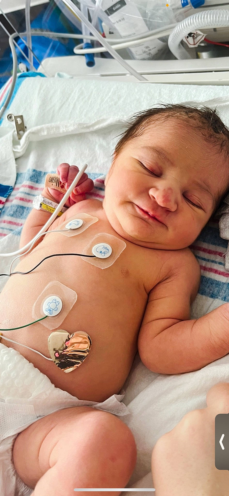 Lakelynn is registered to the contest to win money with this photo: arm, baby, cheek, chest, chin, eye, eyebrow, finger, gesture, happy, mouth, muscle, neck, nose, person, product, skin, smile, stomach, thumb