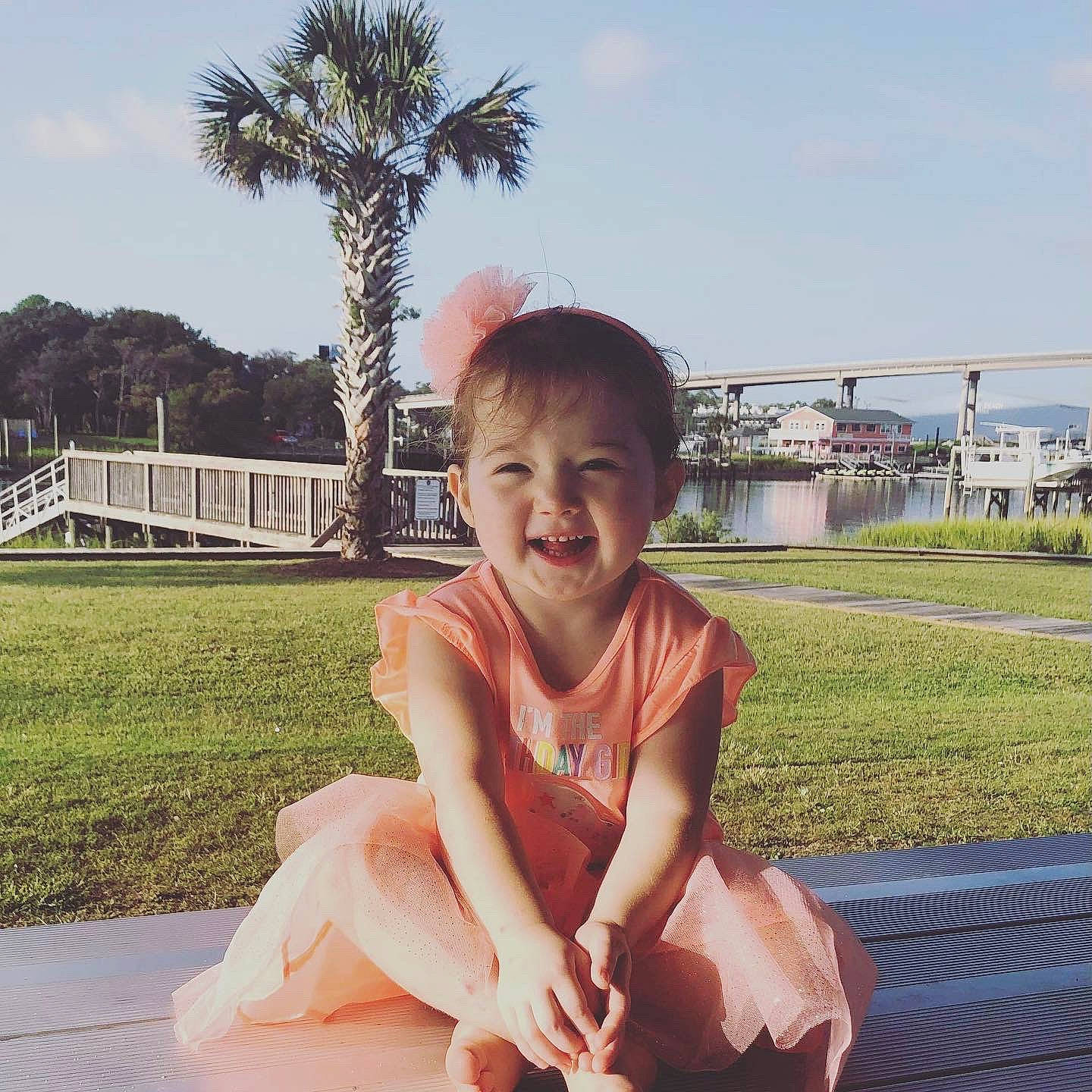 Amara is registered to the contest to win money with this photo: baby_toddler_clothing, cloud, eye, fun, grass, happy, head, leisure, morning, people, person, photograph, plant, shorts, sky, smile, summer, thigh, toddler, travel