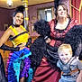 Colton is registered to the contest to win money with this photo: child, smile, costume, theater, performance, dress, colorful, group, indoor, portrait, happy, people, vintage, stage, curtain, makeup, woman, young_child, fun, entertainment
