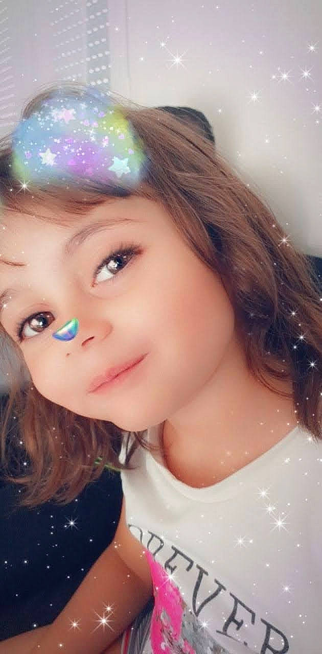 Lilou a rejoint le concours — aidez-le/la à gagner de superbes lots ! bangs, beauty, black_hair, cheek, child, cool, ear, eyebrow, eyelash, flash_photography, forehead, happy, head, iris, lip, long_hair, nose, person, pink, skin