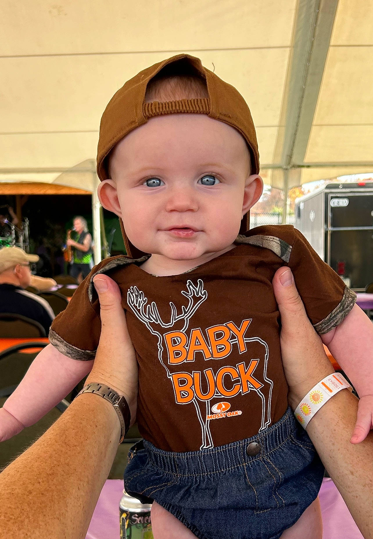 Hunter is registered to the contest to win money with this photo: baby, baby_toddler_clothing, baseball_cap, bracelet, cap, cheek, child, cool, elbow, fashion_accessory, fun, gesture, hand, happy, headwear, jewellery, person, skin, sleeve, t_shirt