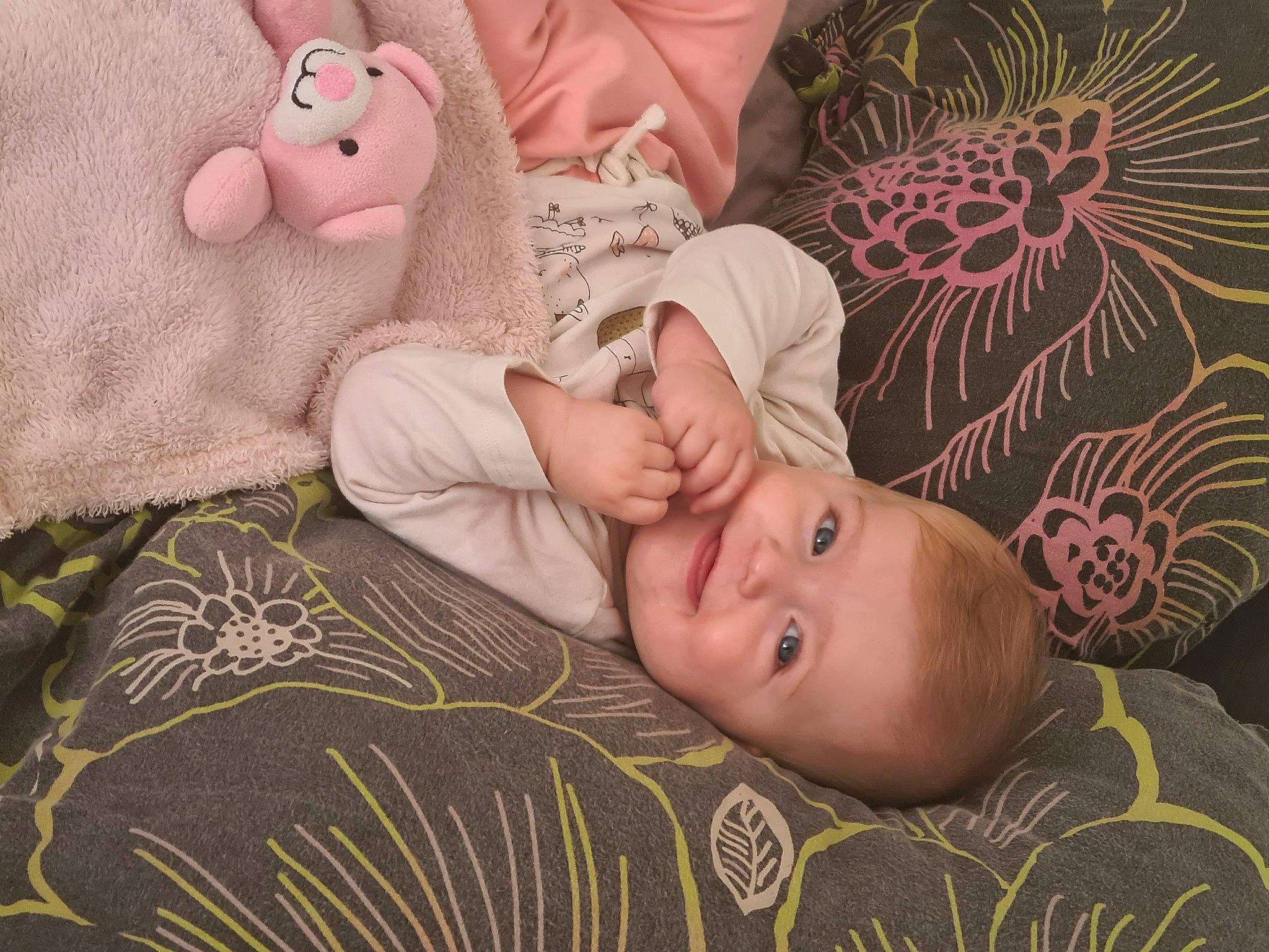 Emma participe au concours pour gagner de l'argent avec cette photo : baby, baby_sleeping, baby_toddler_clothing, cheek, child, comfort, grass, joy, linens, mammal, organ, pattern, person, pink, room, skin, sock, textile, toddler, toy