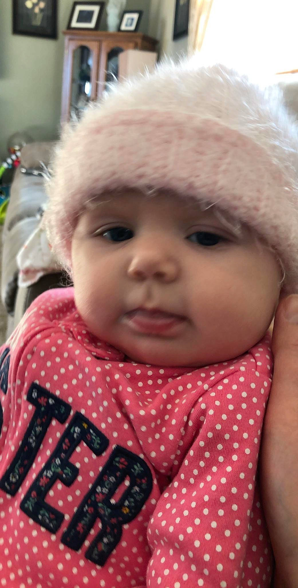 Kynzlee is registered to the contest to win money with this photo: baby, cheek, child, face, head, headgear, headwear, lip, nose, pattern, person, pink, skin, smile, toddler