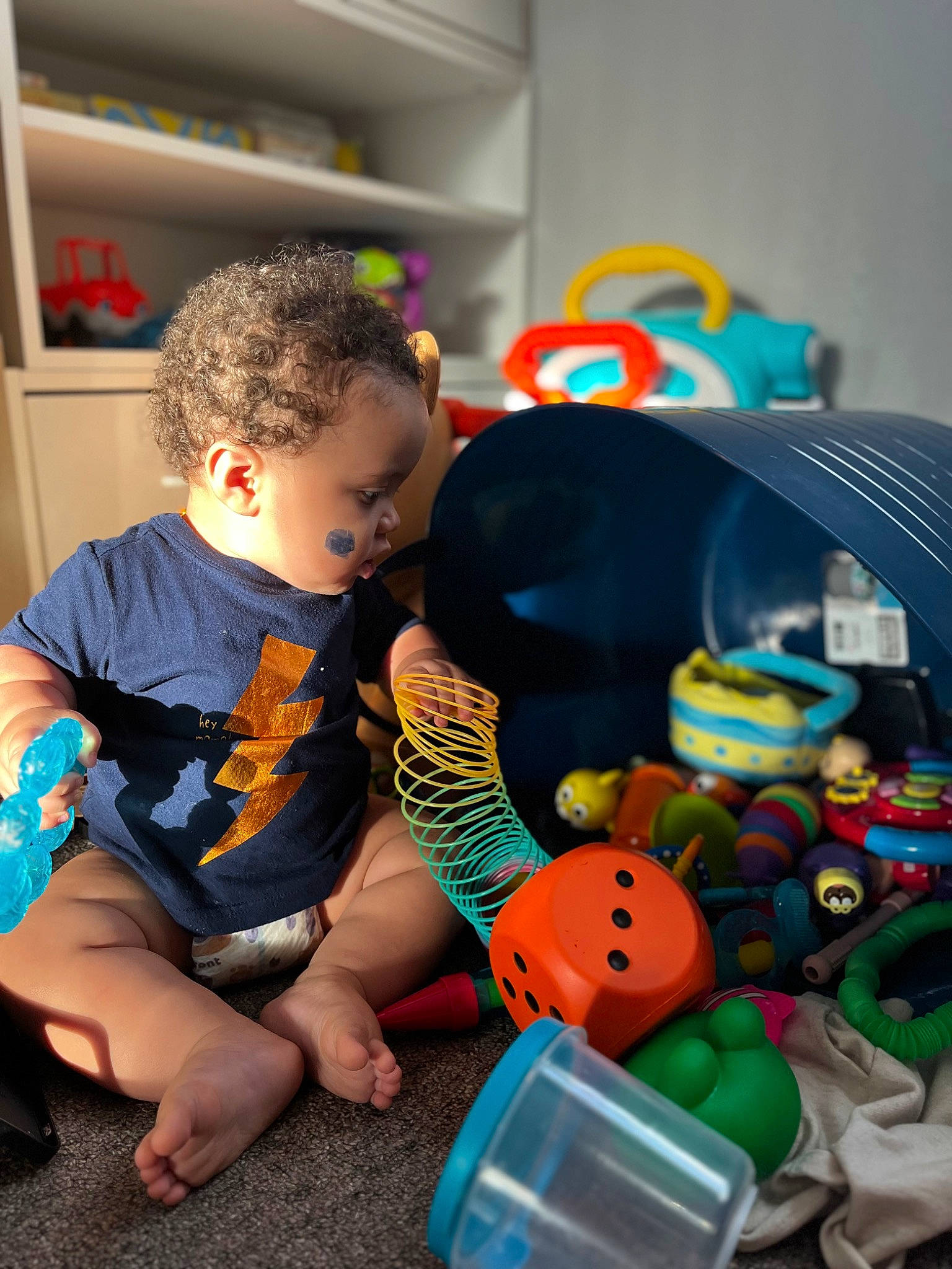 Zyaire joined the competition — help win amazing prizes! baby, baby_playing_with_toys, baby_toys, child, easter, event, flooring, fun, happy, leisure, party_supply, person, plastic, play, room, sitting, snapshot, stuffed_toy, t_shirt, toddler