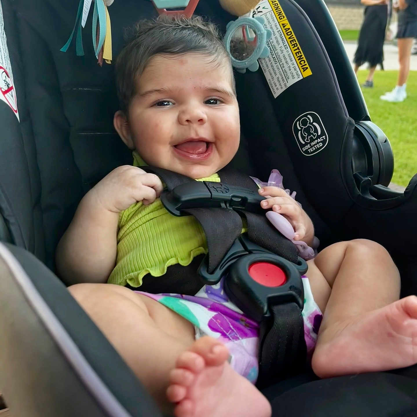 Abigail is registered to the contest to win money with this photo: adult, baby, babylaughing, car, clothing, face, female, gun, happy, head, person, photography, portrait, shorts, smile, tape, transportation, vehicle, weapon, woman