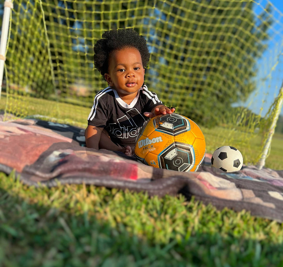 Cai joined the competition — help win amazing prizes! ball, ball_game, competition_event, football, football_player, grass, leisure, mesh, net, people_in_nature, person, player, soccer, soccer_ball, sports, sports_equipment, sports_gear, team_sport, tournament, toy