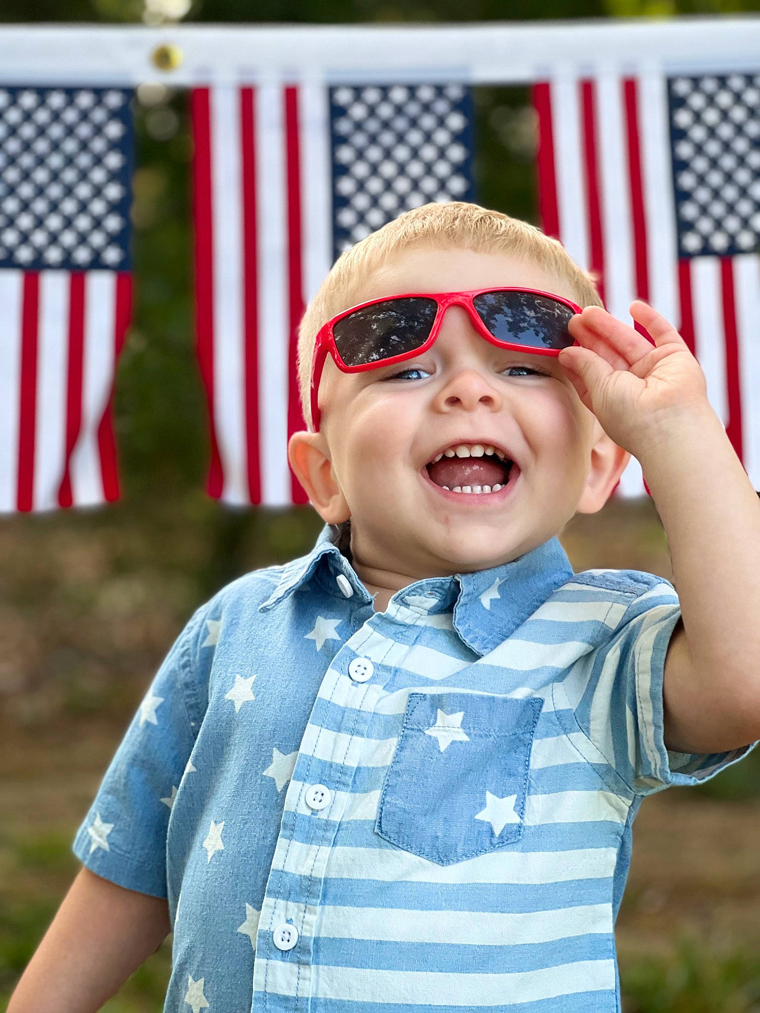 Clinton joined the competition — help win amazing prizes! baby_toddler_clothing, blue, cap, electric_blue, eyewear, flag, flag_day_usa, flag_of_the_united_states, gesture, goggles, happy, headgear, person, personal_protective_equipment, recreation, sleeve, street_fashion, sunglasses, toddler, vision_care