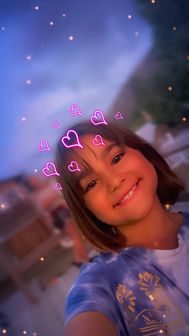 Hollie joined the competition — help win amazing prizes! beauty, electric_blue, event, face, fashion_accessory, flash_photography, fun, happy, headwear, joy, leisure, magenta, midnight, night, person, pink, purple, smile, space, toddler