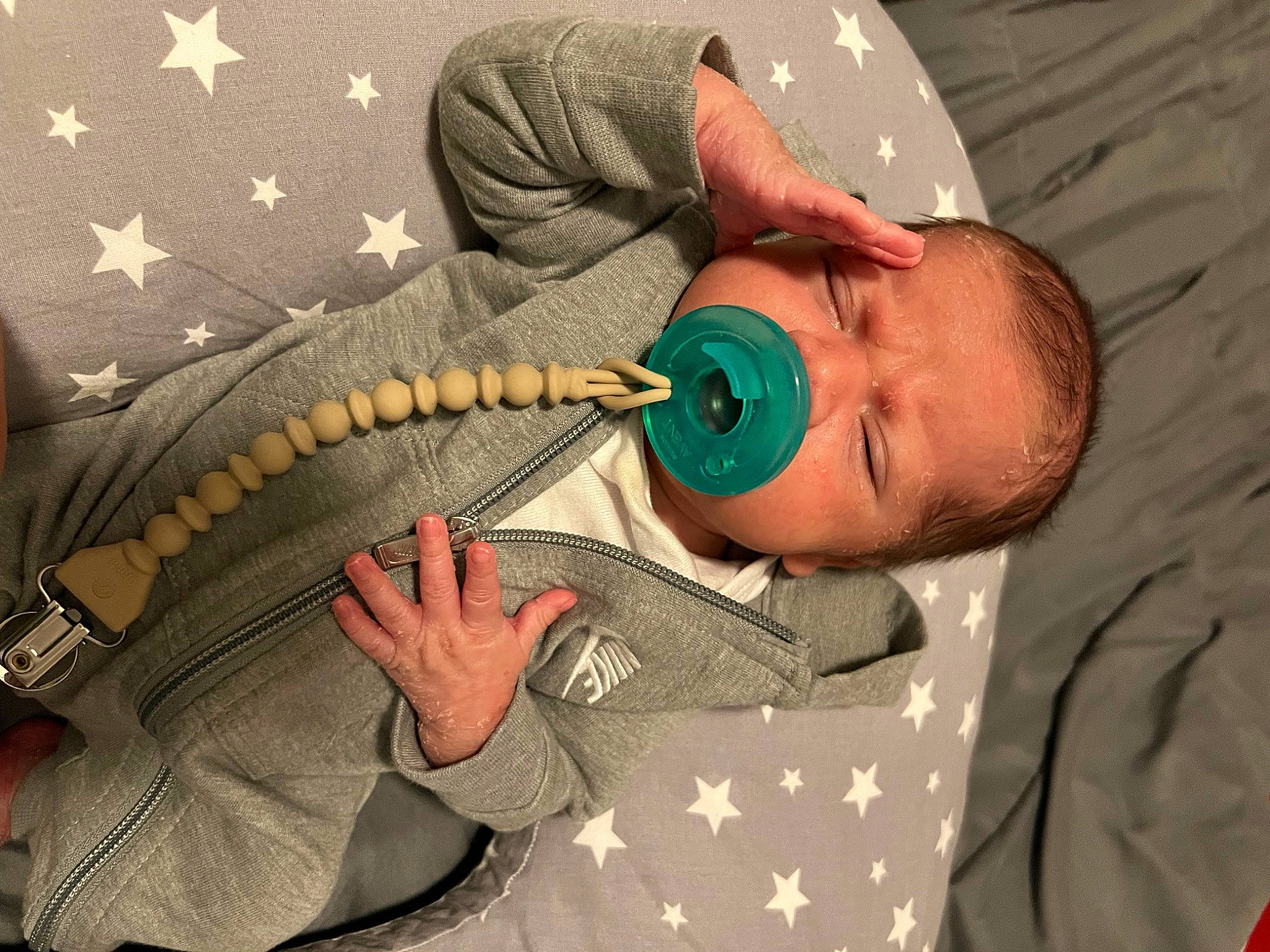 Ezekiel is registered to the contest to win money with this photo: baby, camouflage, child, comfort, elbow, finger, gesture, hat, joint, medical, medical_procedure, military_camouflage, military_uniform, mouth, patient, pattern, person, personal_protective_equipment, soldier, textile