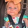 Blakely is registered to the contest to win money with this photo: baby, child, stroller, headband, orange_bow, face, blue_eyes, polka_dot, clothing, straps, cute, infant, portrait, expression, seat, baby_seat, colorful, app_icons, mobile_screen, chicco
