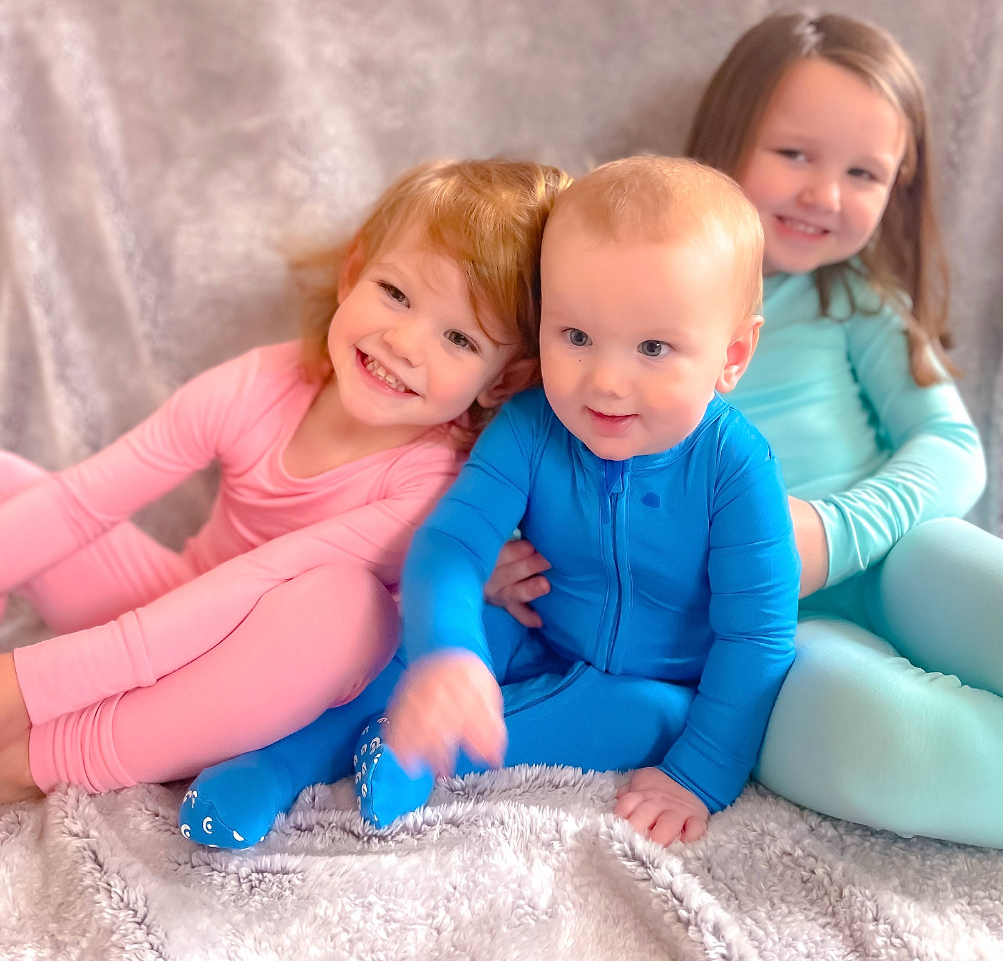 Atley is registered to the contest to win money with this photo: baby, baby_toddler_clothing, clothing, comfort, eye, face, finger, fun, gesture, happy, head, interaction, iris, joy, person, product, skin, sleeve, smile, standing