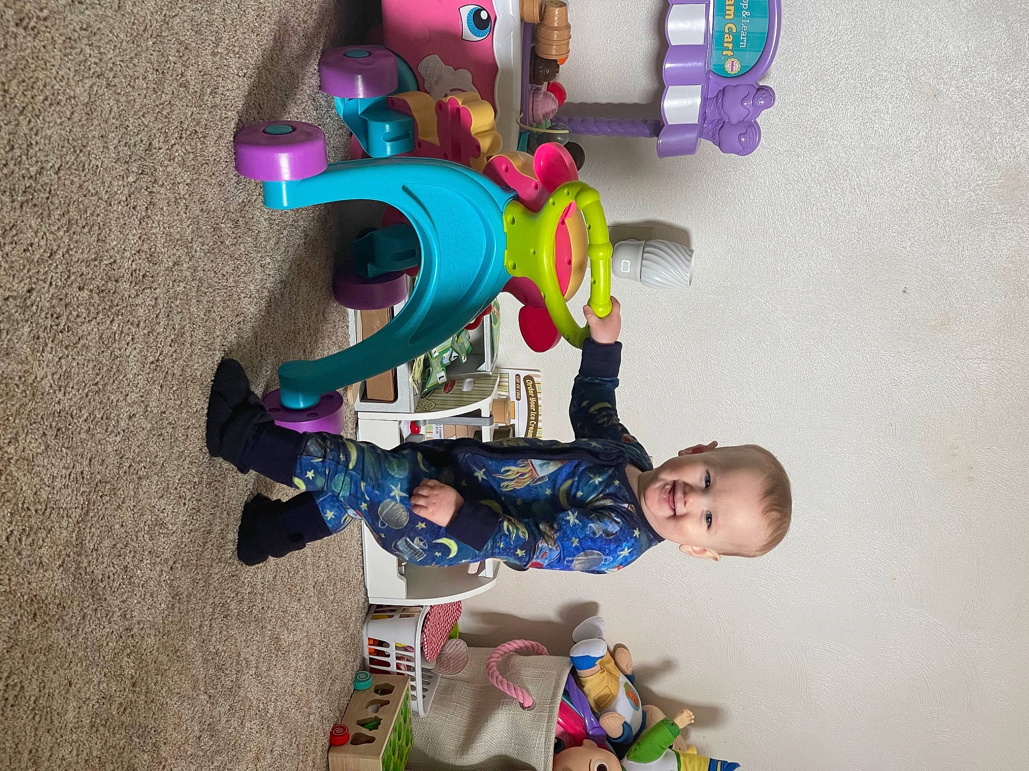 Maddox joined the competition — help win amazing prizes! art, baby, baby_products, baby_toys, child, event, fun, joy, leisure, magenta, person, plastic, play, room, toddler, toy, visual_arts