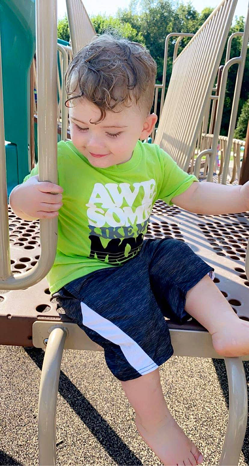 Damain joined the competition — help win amazing prizes! barefoot, face, finger, fun, grass, green, hairstyle, happy, joint, knee, leg, leisure, person, photograph, public_space, shorts, shoulder, skin, thigh, toddler