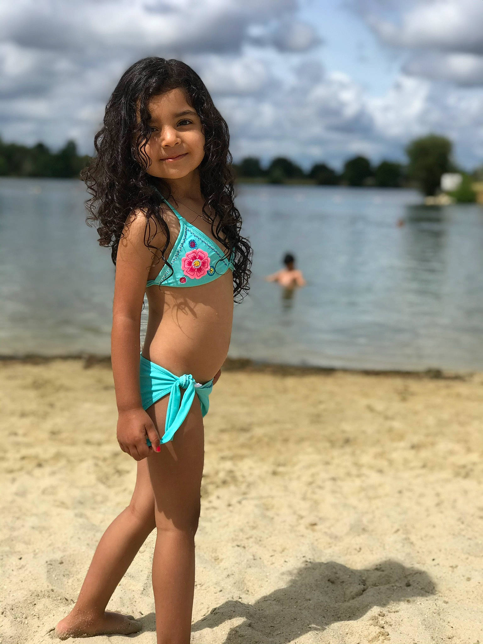 Maryam participe au concours pour gagner de l'argent avec cette photo : azure, beach, body_of_water, brassiere, clothing, cloud, flash_photography, joy, leg, lingerie_top, people_in_nature, people_on_beach, person, sky, smile, swimsuit_bottom, swimsuit_top, swimwear, thigh, underpants