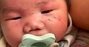 Malachi joined the competition — help win amazing prizes! baby, blanket, caregiver, cheeks, close_up, clothing, cozy, eyes, face, head, indoors, infant, mouth, newborn, nose, pacifier, photography, portrait, skin, sleepy