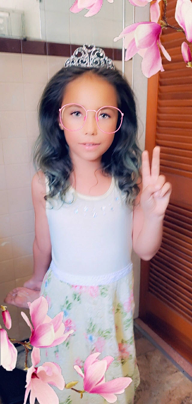 Annaleesia is registered to the contest to win money with this photo: arm, day_dress, dress, eyelash, face, glasses, hair, hairstyle, hand, head, joint, leg, neck, organ, person, pink, shoulder, skin, sleeve, vision_care