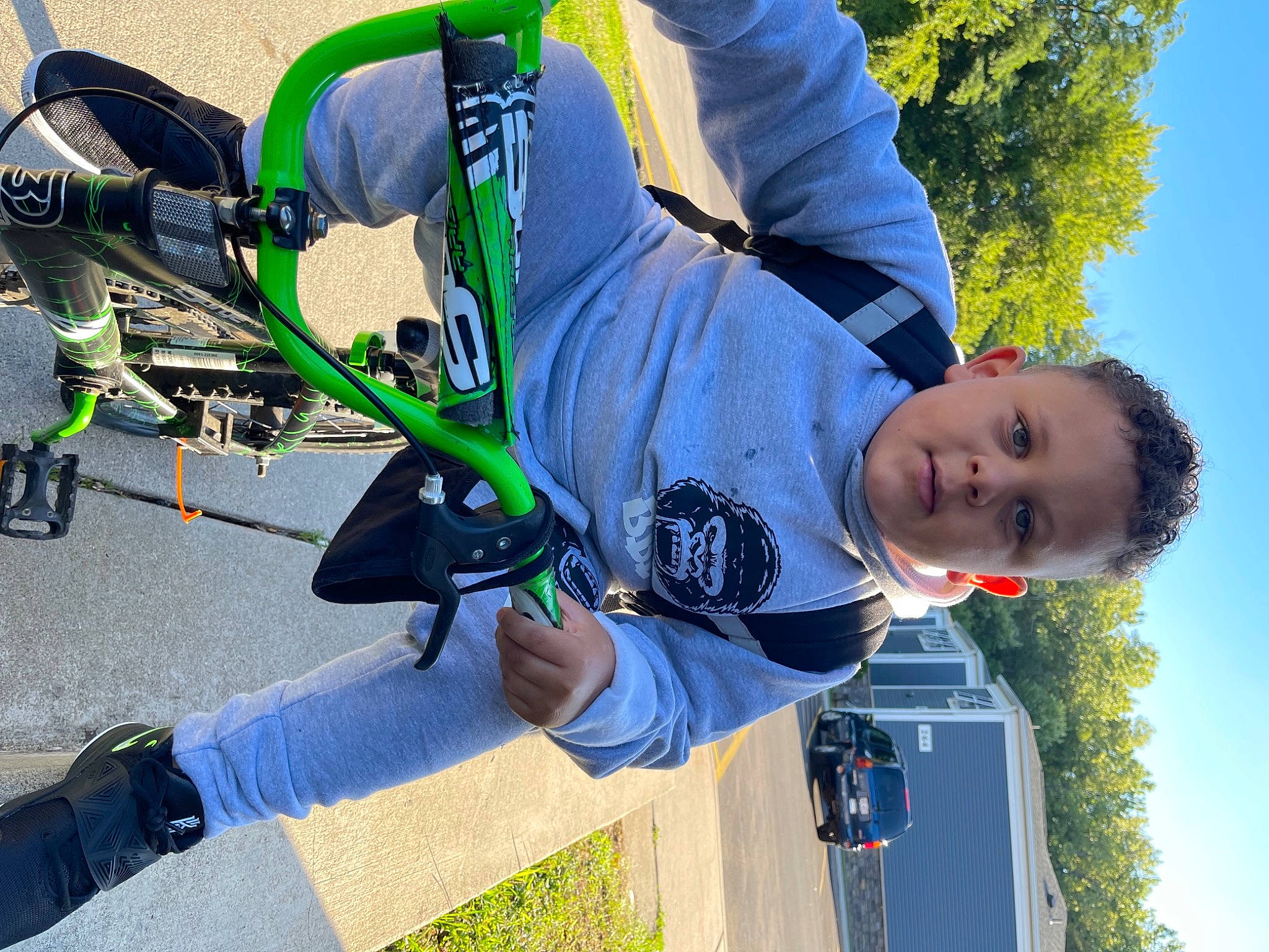 Carter joined the competition — help win amazing prizes! automotive_tire, bicycle_clothing, bicycle_fork, bicycle_frame, bicycle_handlebar, bicycle_tire, bicycle_wheel, bicycles_equipment_and_supplies, cool, green, leisure, person, plant, sky, sports_equipment, tire, toddler, tree, wheel, woody_plant