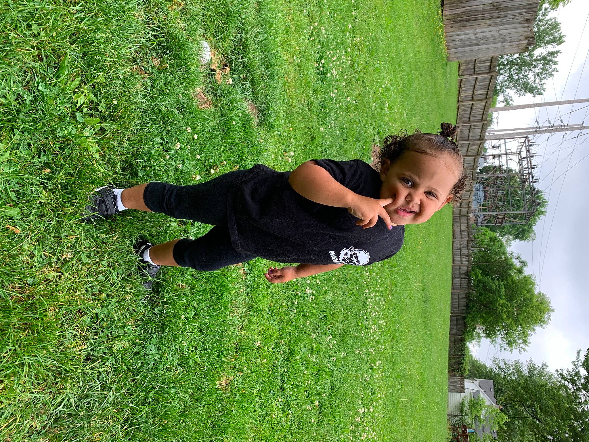 Arielle joined the competition — help win amazing prizes! fun, grass, grassland, green, happy, lawn, leisure, meadow, people_in_nature, person, plant, recreation, shorts, shrub, sky, spring, t_shirt, tree