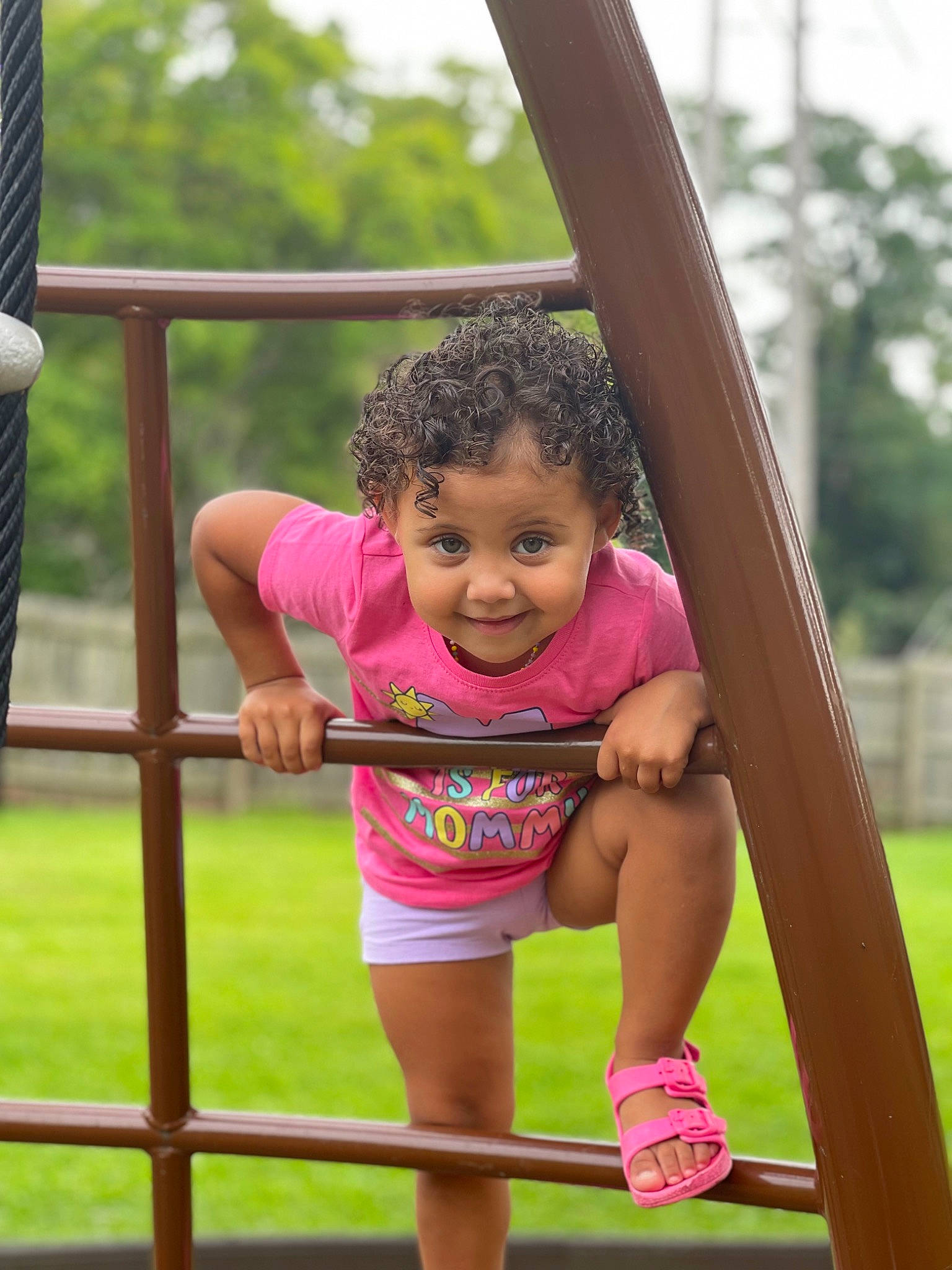 Arielle joined the competition — help win amazing prizes! arm, baby_toddler_clothing, city, fun, grass, hand, happy, human_body, joy, leg, leisure, magenta, outdoor_play_equipment, person, pink, playground, recreation, shorts, skin, swing