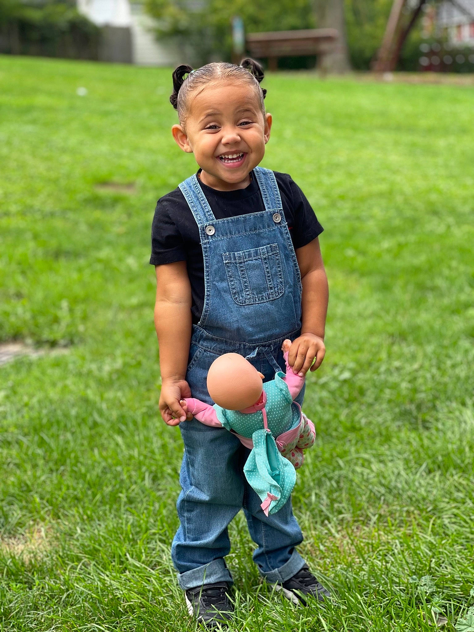 Arielle is registered to the contest to win money with this photo: baby_toddler_clothing, ball, fun, grass, grass_family, grassland, happy, jeans, joy, lawn, leg, leisure, mammal, meadow, people_in_nature, person, plant, shorts, smile, sneakers