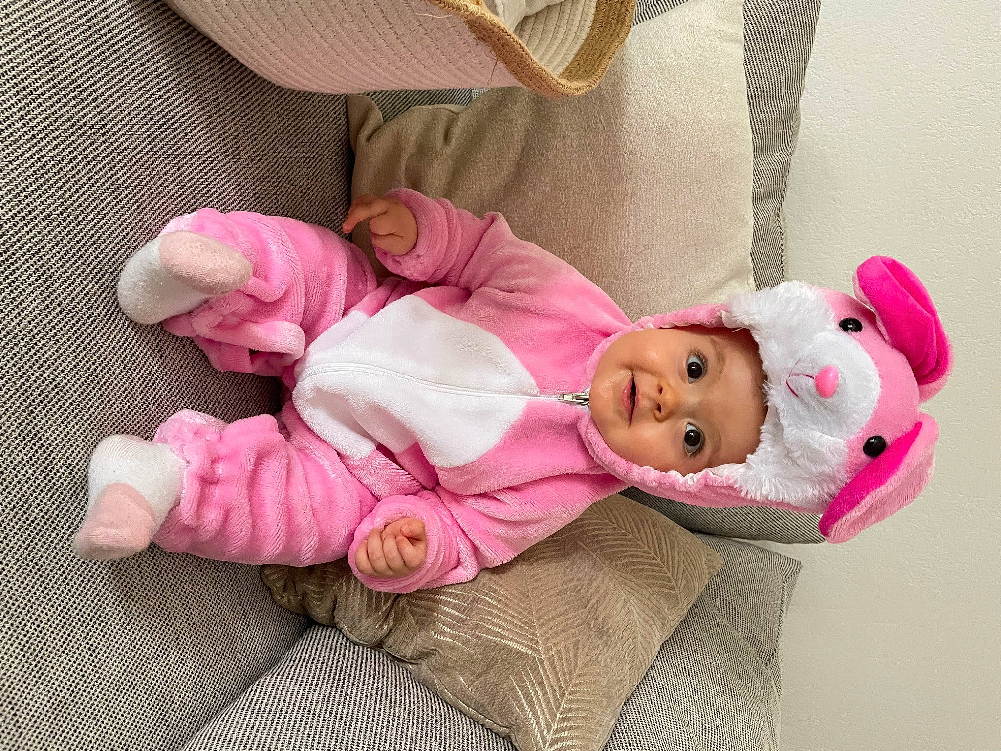 Line participe au concours pour gagner de l'argent avec cette photo : arm, baby, baby_products, baby_toddler_clothing, cheek, child, comfort, fashion_accessory, headgear, headwear, linens, magenta, pattern, person, pink, skin, sleeve, smile, sock, textile