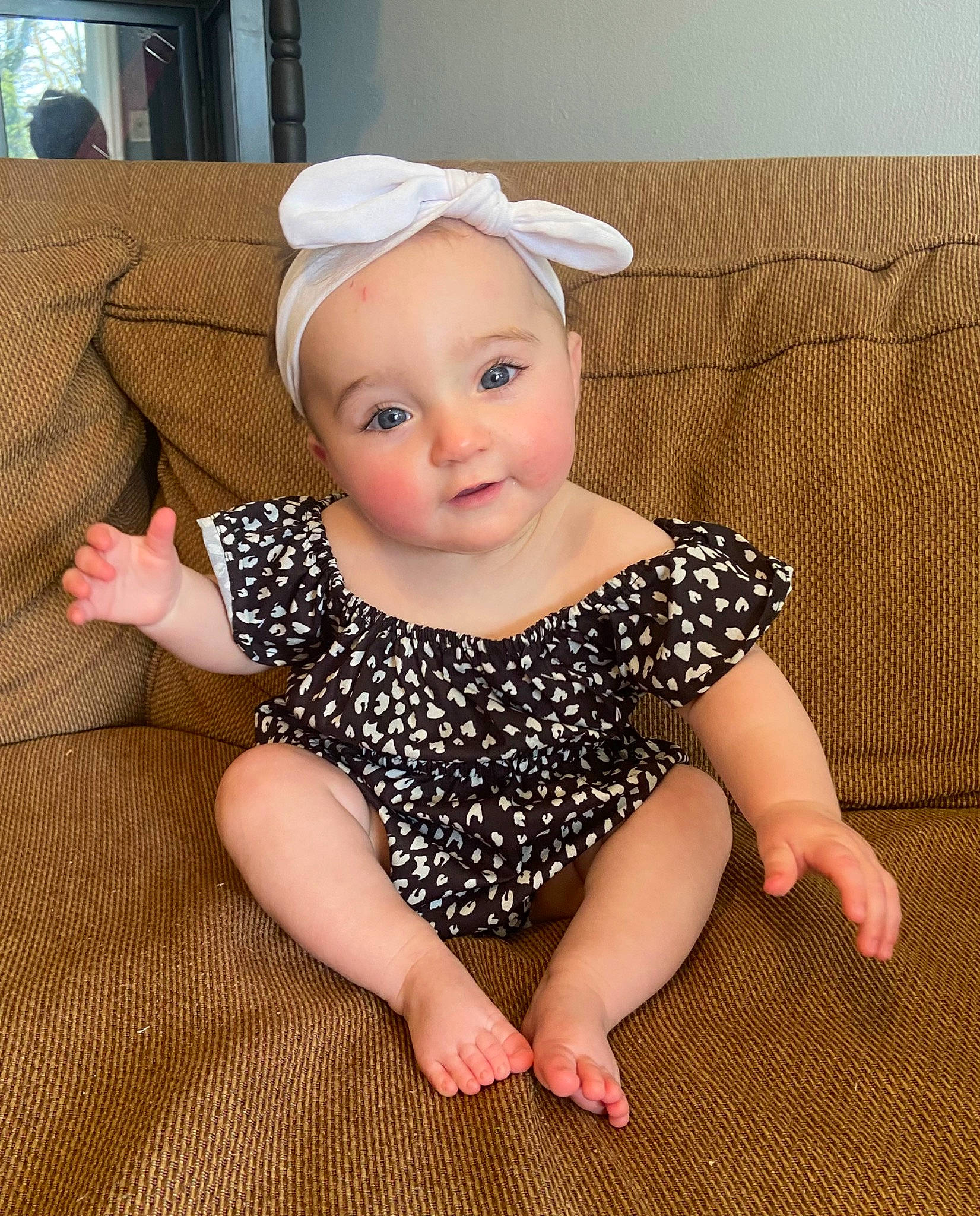 Claire joined the competition — help win amazing prizes! baby, baby_toddler_clothing, cap, cheek, chin, eye, face, flooring, foot, head, human_leg, iris, leg, lip, neck, pattern, person, sleeve, thigh, thumb