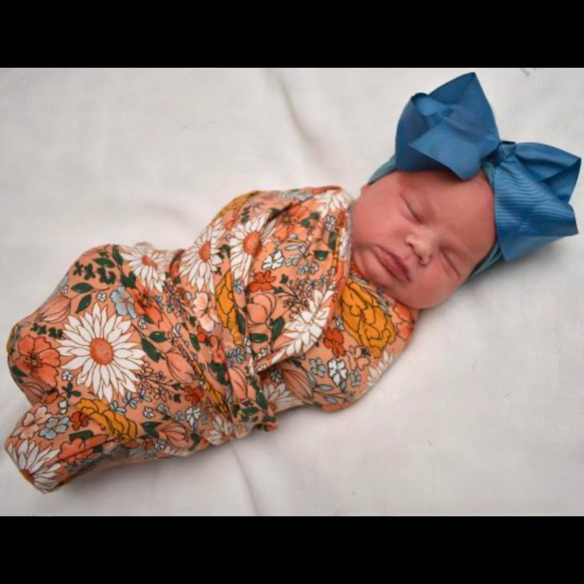 Karsyn is registered to the contest to win money with this photo: baby, baby_products, baby_sleeping, baby_toddler_clothing, beanie, cap, child, collar, comfort, fashion_accessory, happy, headgear, headwear, knit_cap, linens, orange, outerwear, pattern, person, sleeve