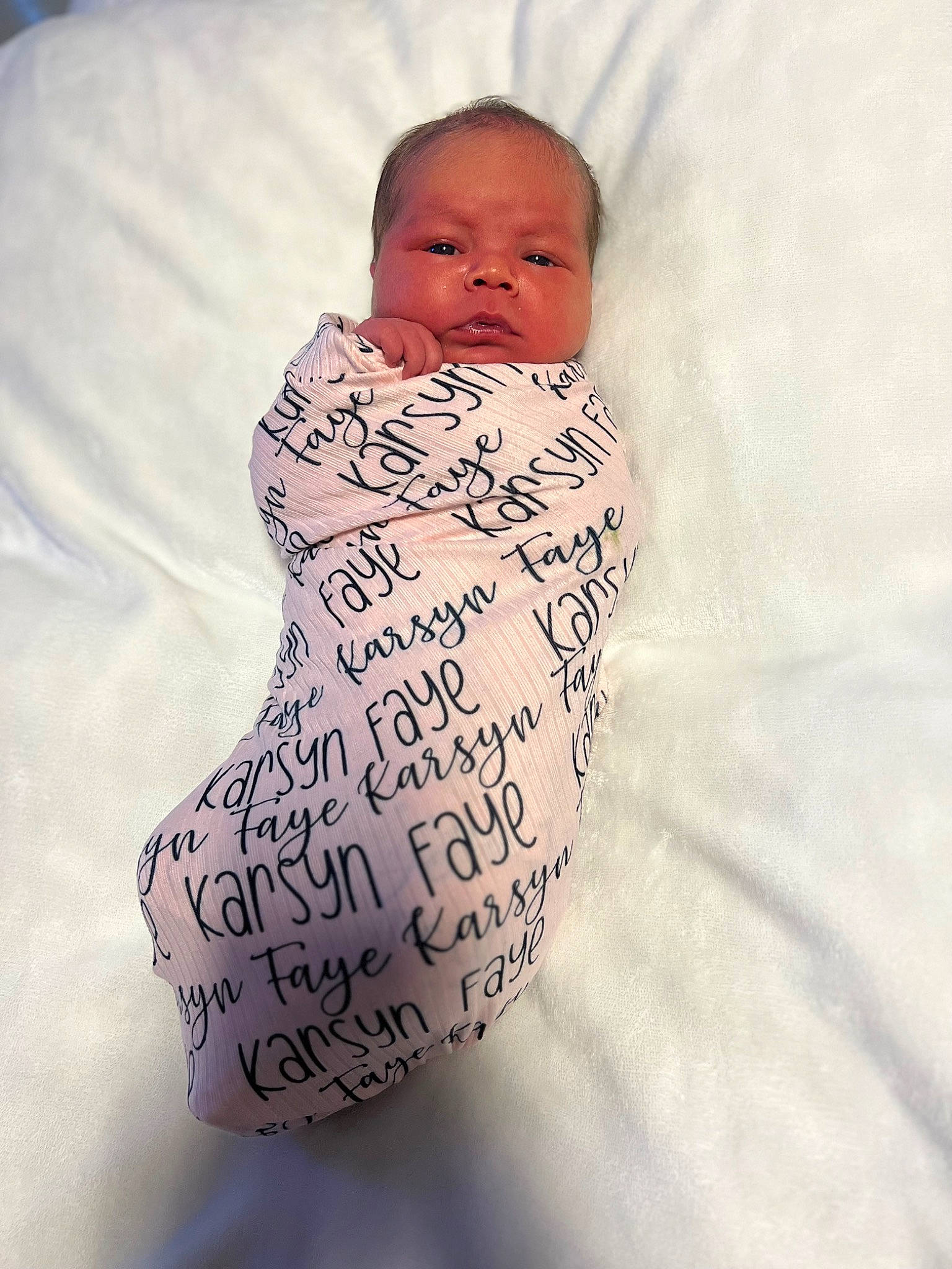 Karsyn is registered to the contest to win money with this photo: arm, art, baby, baby_products, baby_sleeping, baby_toddler_clothing, chest, child, comfort, eye, hand, happy, headgear, human_body, linens, neck, person, skin, sleeve, stomach