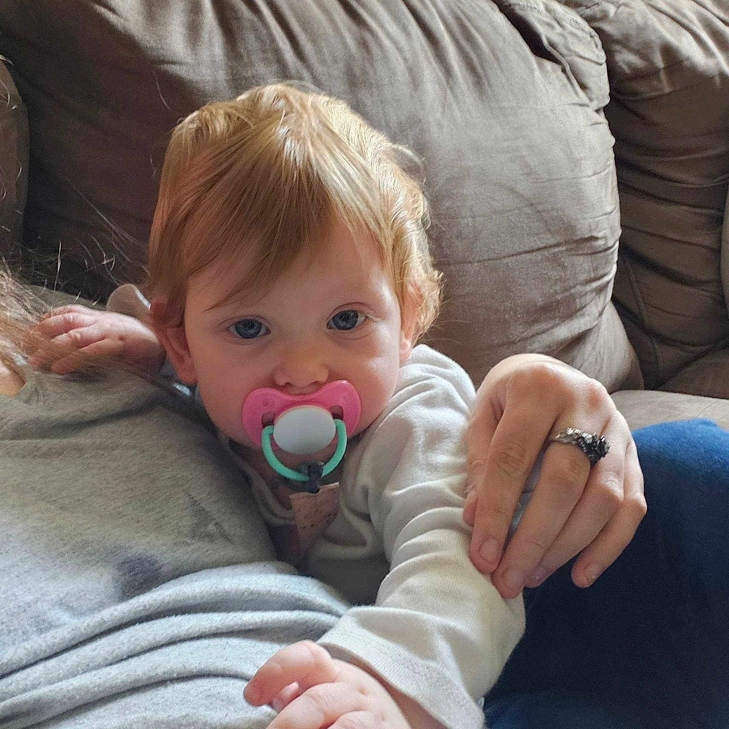 Avalise is registered to the contest to win money with this photo: accessories, baby, bodypart, clothing, couch, cushion, face, finger, furniture, glasses, hand, head, homedecor, jewelry, pants, person, photography, pillow, portrait, ring