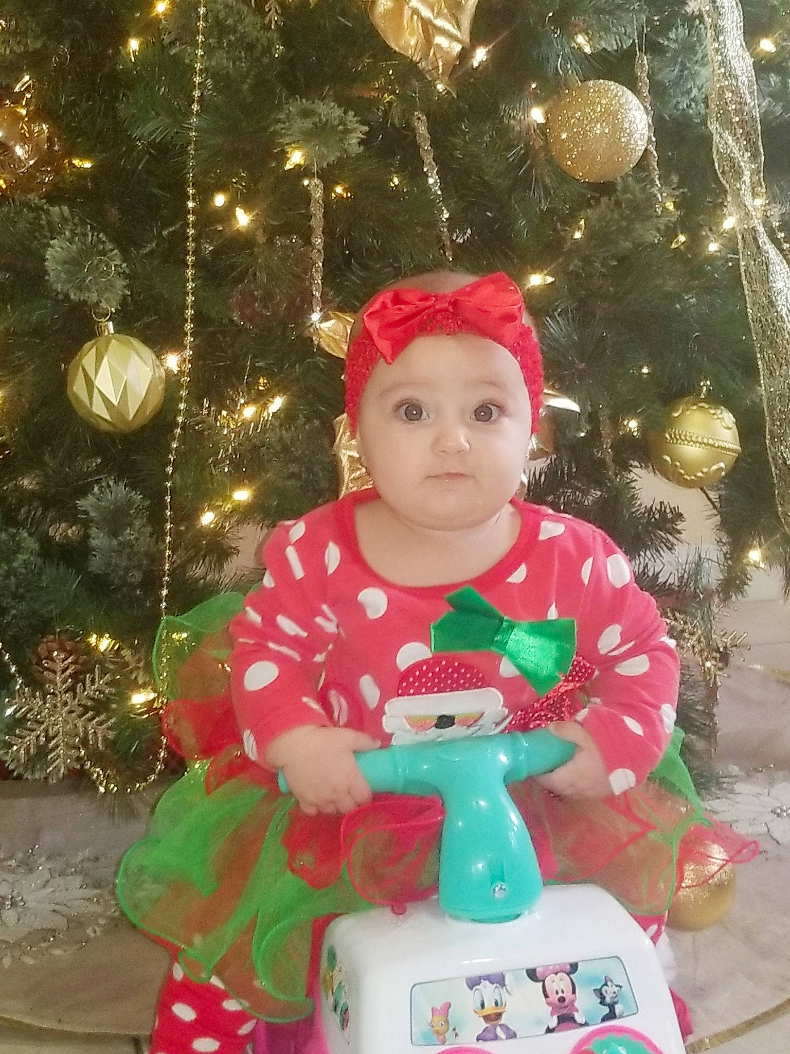 Angie joined the competition — help win amazing prizes! child, christmas, christmas_decoration, christmas_ornament, christmas_tree, event, holiday, infant, person, pink, product, red, smile, toddler