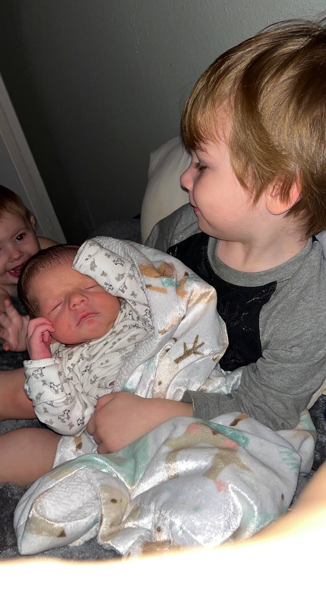 Cooper is registered to the contest to win money with this photo: baby, baby_toddler_clothing, cheek, child, comfort, couch, event, finger, fun, happy, hat, lap, mammal, mouth, people, person, room, sitting, sleep, toddler