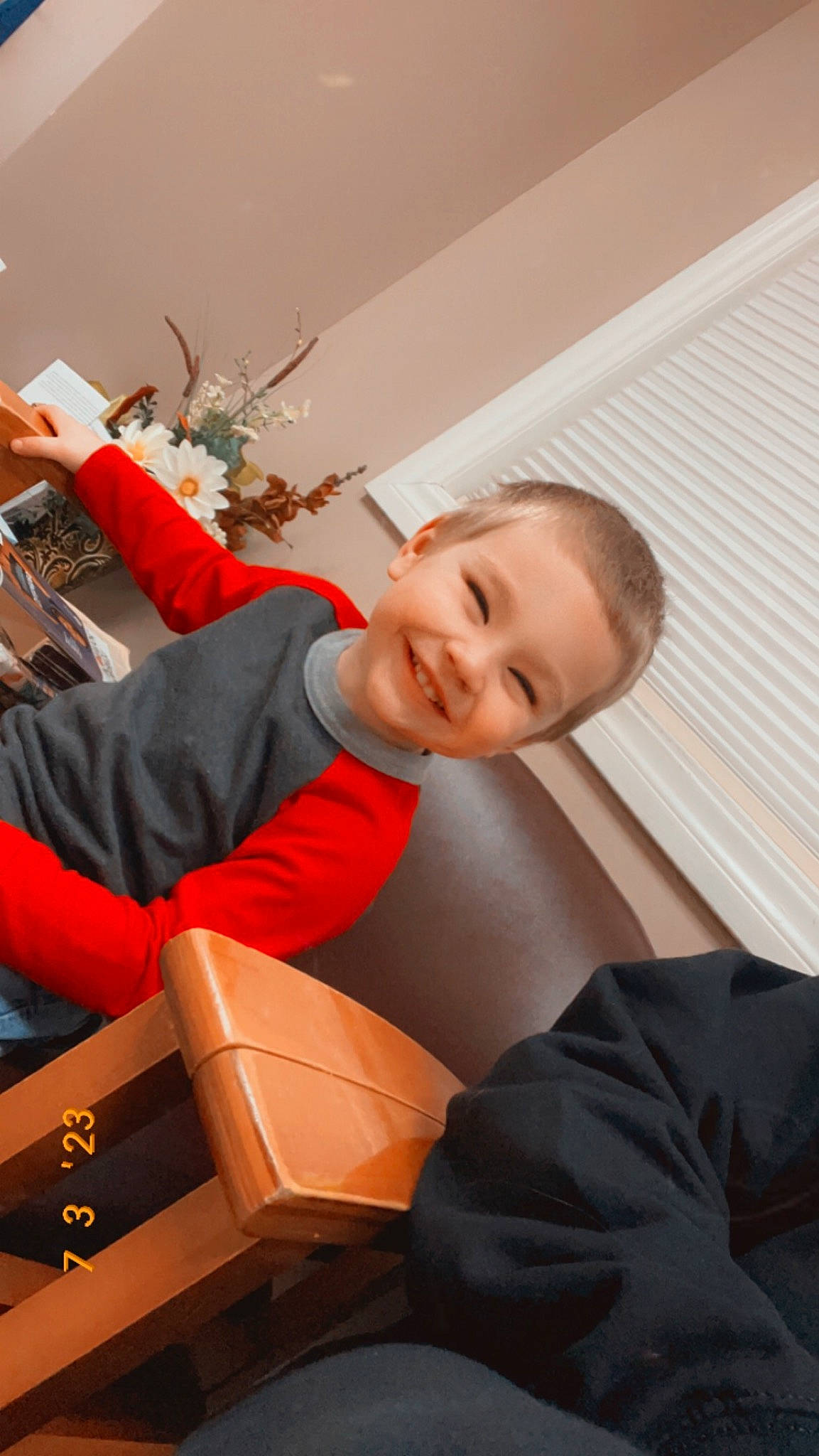 Cooper joined the competition — help win amazing prizes! chair, christmas, christmas_decoration, christmas_eve, christmas_ornament, comfort, event, flooring, formal_wear, fun, happy, holiday, joy, lap, laugh, person, room, sitting, smile, toddler