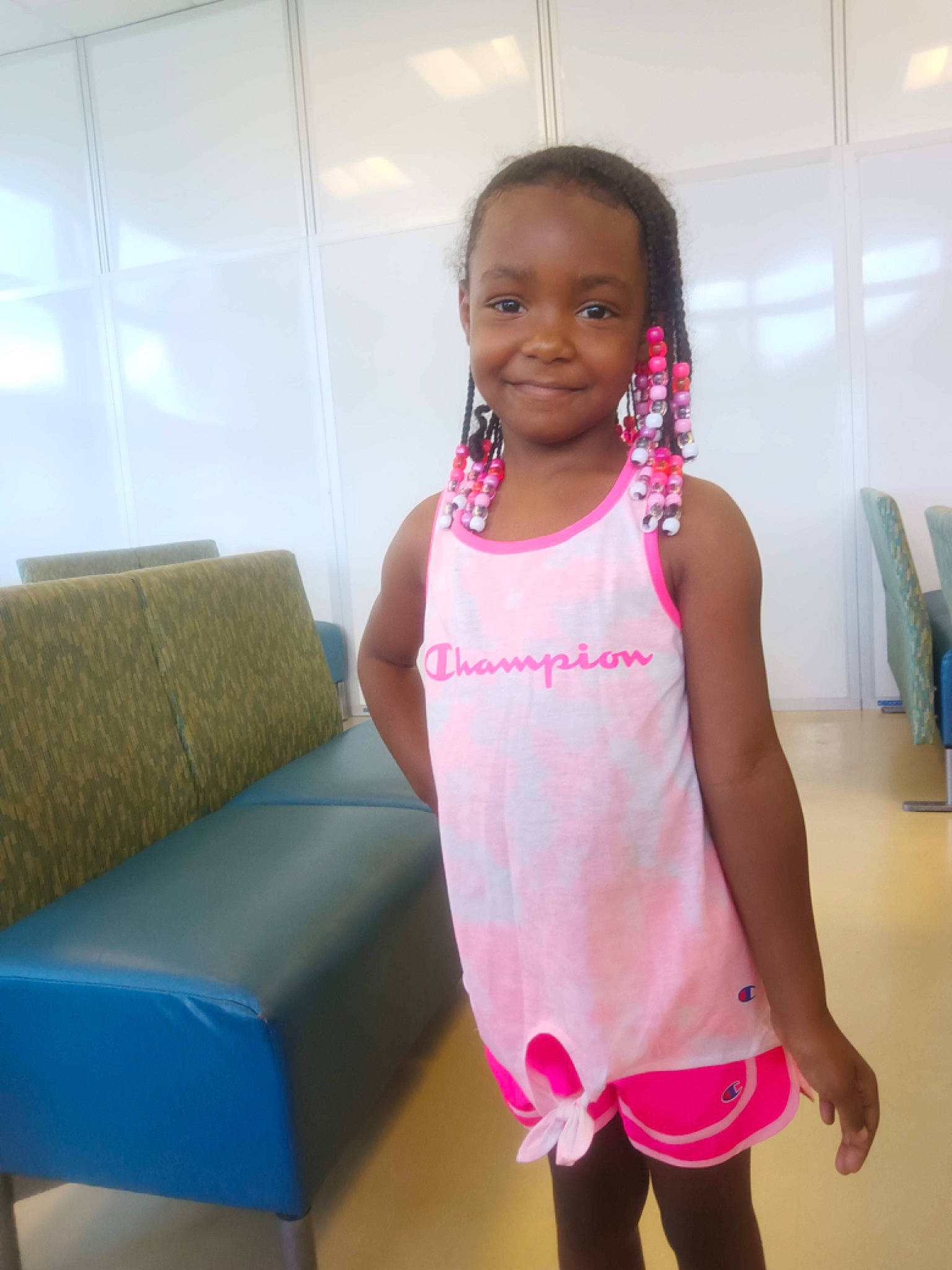 Antonia Amarriana Gwyn joined the competition — help win amazing prizes! baby_toddler_clothing, child, comfort, couch, dress, fun, happy, human_leg, joy, leisure, magenta, neck, person, pink, sleeve, smile, sportswear, studio_couch, t_shirt, thigh