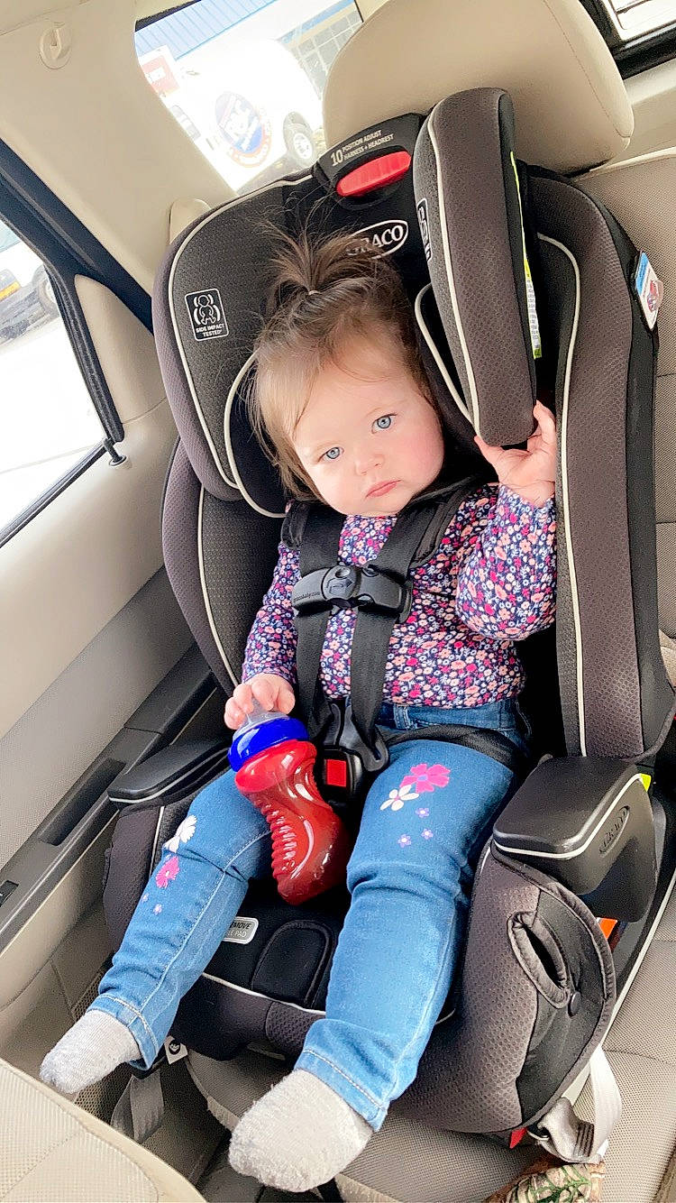 Haisley is registered to the contest to win money with this photo: air_travel, airline, auto_part, automotive_design, baby_in_car_seat, baby_products, car_seat, car_seat_cover, child, comfort, electric_blue, family_car, head_restraint, mode_of_transport, person, seat_belt, service, steering_part, toddler, vehicle_door