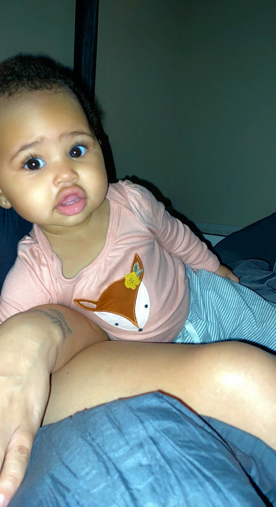 Wynter is registered to the contest to win money with this photo: baby_toddler_clothing, cheek, comfort, elbow, eye, eyelash, finger, hairstyle, head, human_body, human_leg, iris, knee, lap, lip, mouth, nose, person, skin, thigh