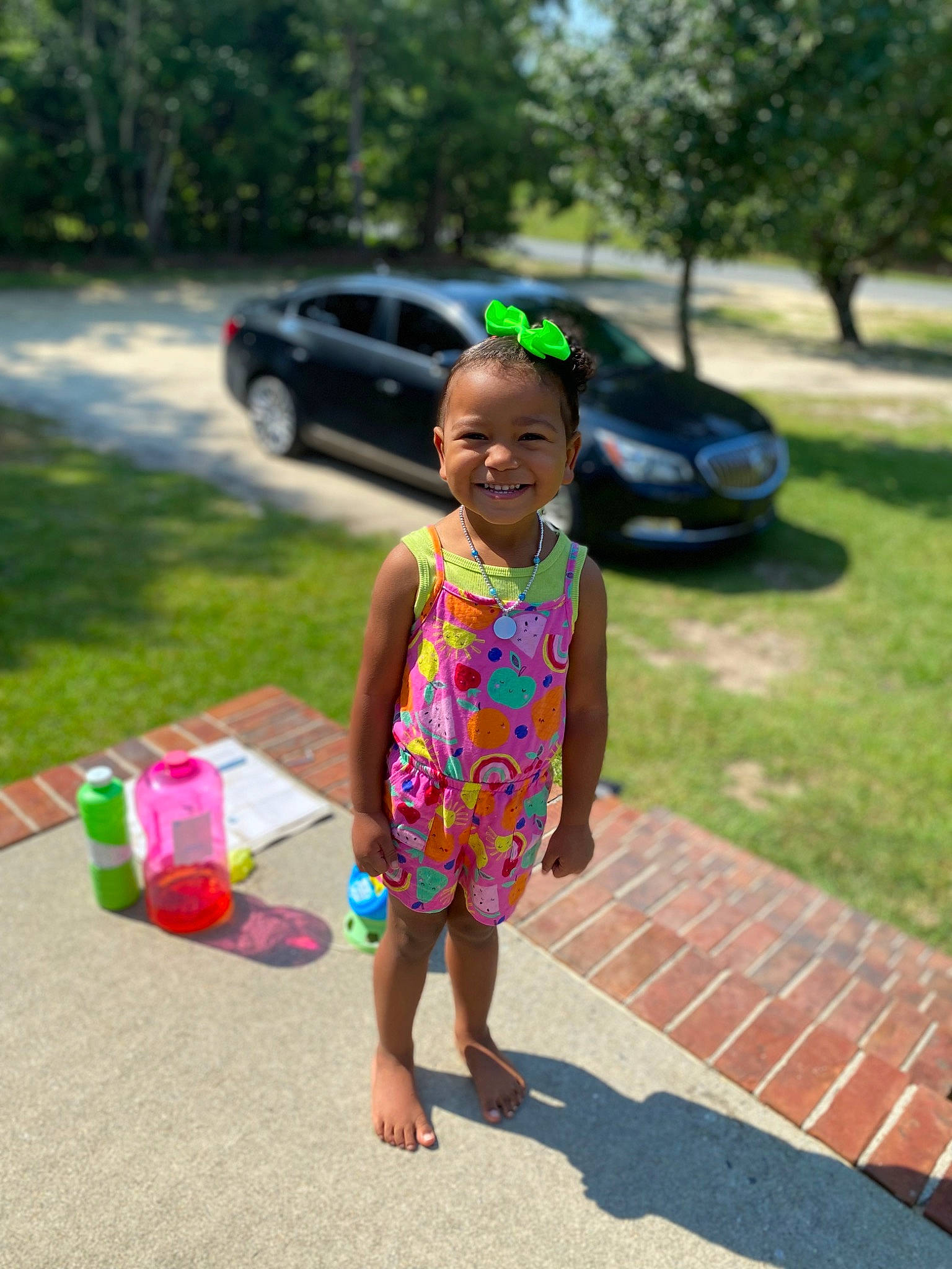 Alyssa joined the competition — help win amazing prizes! asphalt, car, dress, fun, grass, happy, joy, land_vehicle, leisure, magenta, person, plant, recreation, road, road_surface, smile, summer, tire, toddler, tree