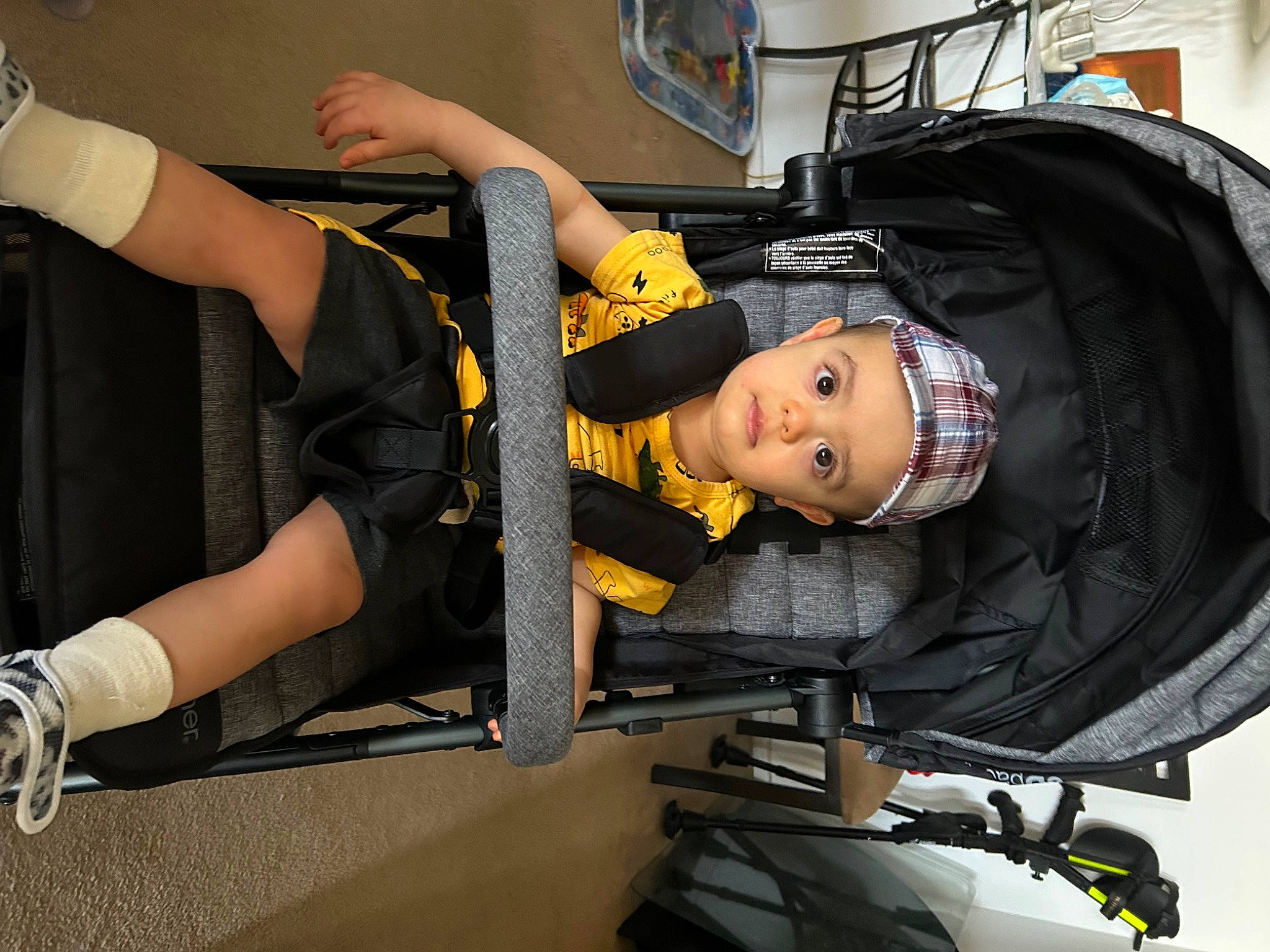 Abel is registered to the contest to win money with this photo: arm, auto_part, automotive_design, automotive_exterior, automotive_tire, automotive_wheel_system, bag, chair, headwear, human_leg, knee, machine, motor_vehicle, person, personal_protective_equipment, rim, service, thigh, tire, vehicle_door